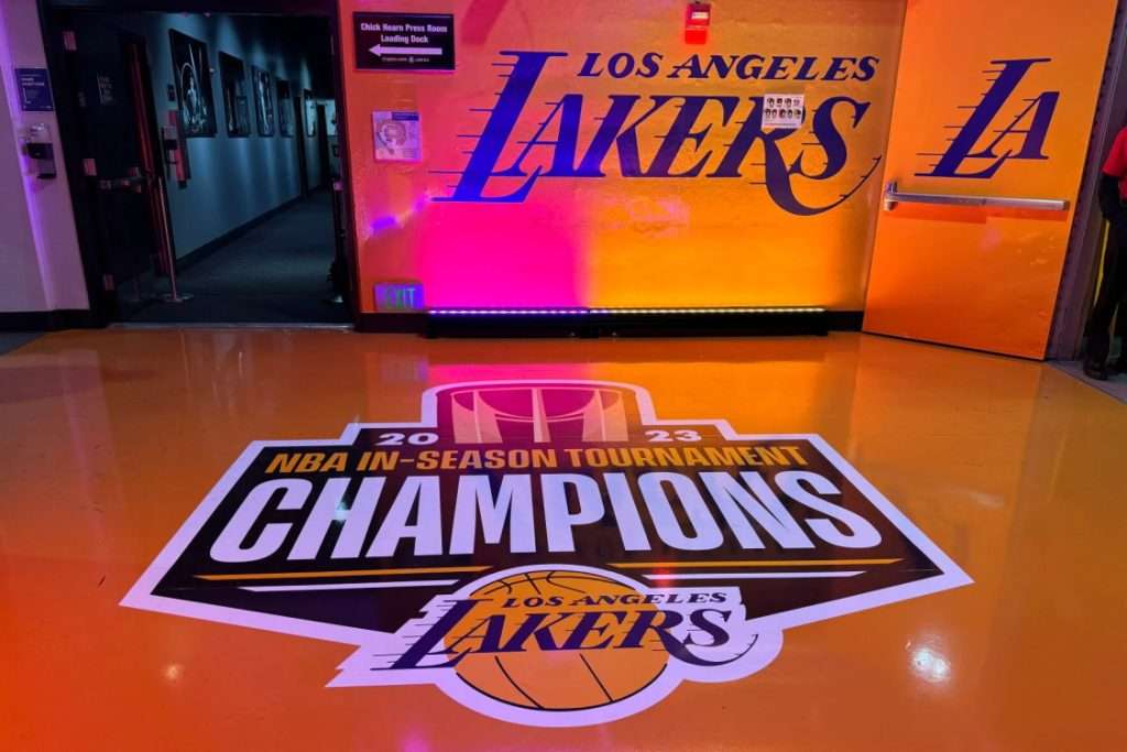 A Los Angeles Lakers In-Season Tournament Champions logo at the Crypto.com Arena.