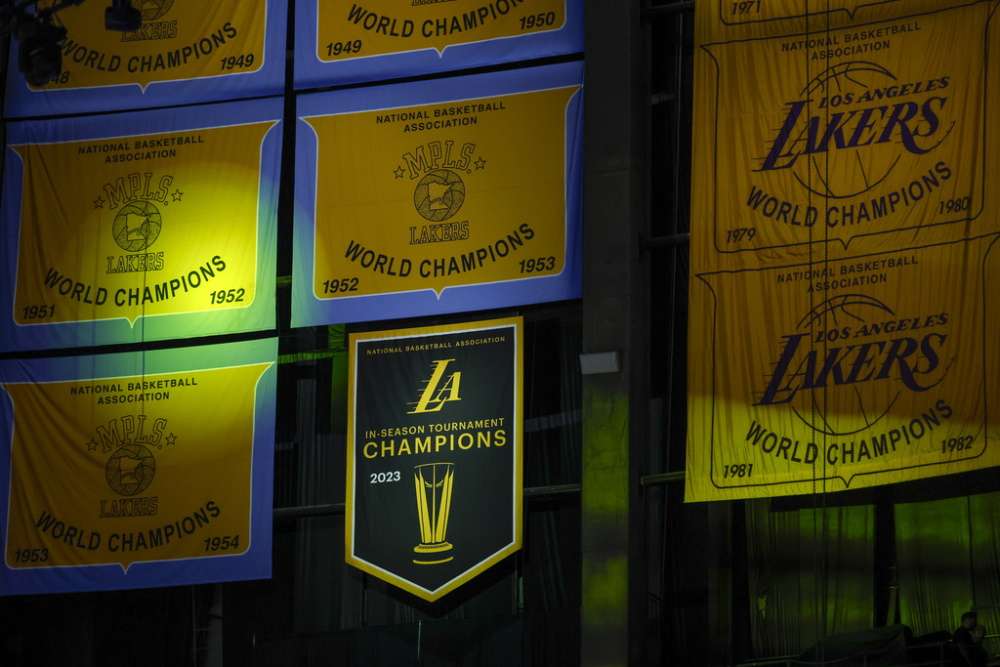 A Los Angeles Lakers' 2023 NBA In-Season Tournament Champions banner is unveiled prior to an NBA basketball game against the New York Knicks at Crypto.com Arena, Monday December 18, 2023, in Los Angeles.